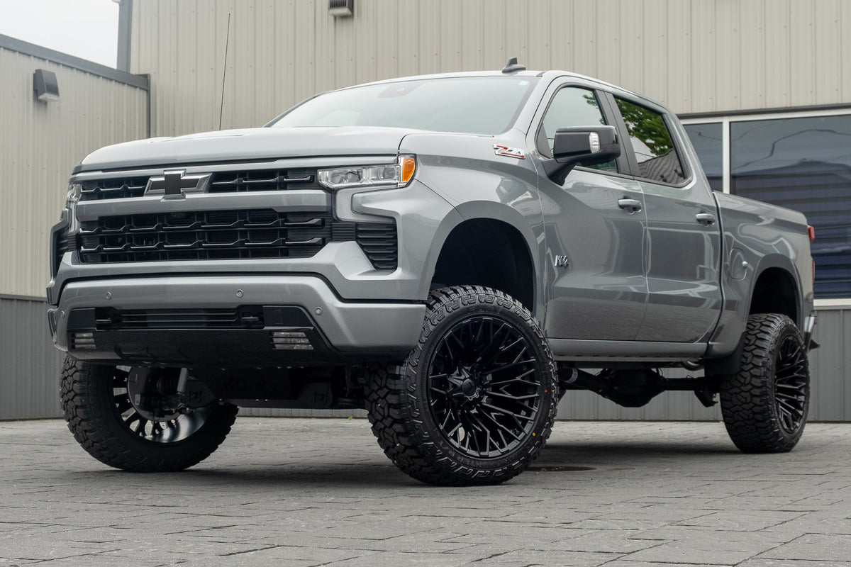 2026 Chevrolet Silverado 1500 RST with a 6" Rough Country lift kit, 22x12 Fuel Strike wheels, and 35" Fury Country Hunter R/T tires.