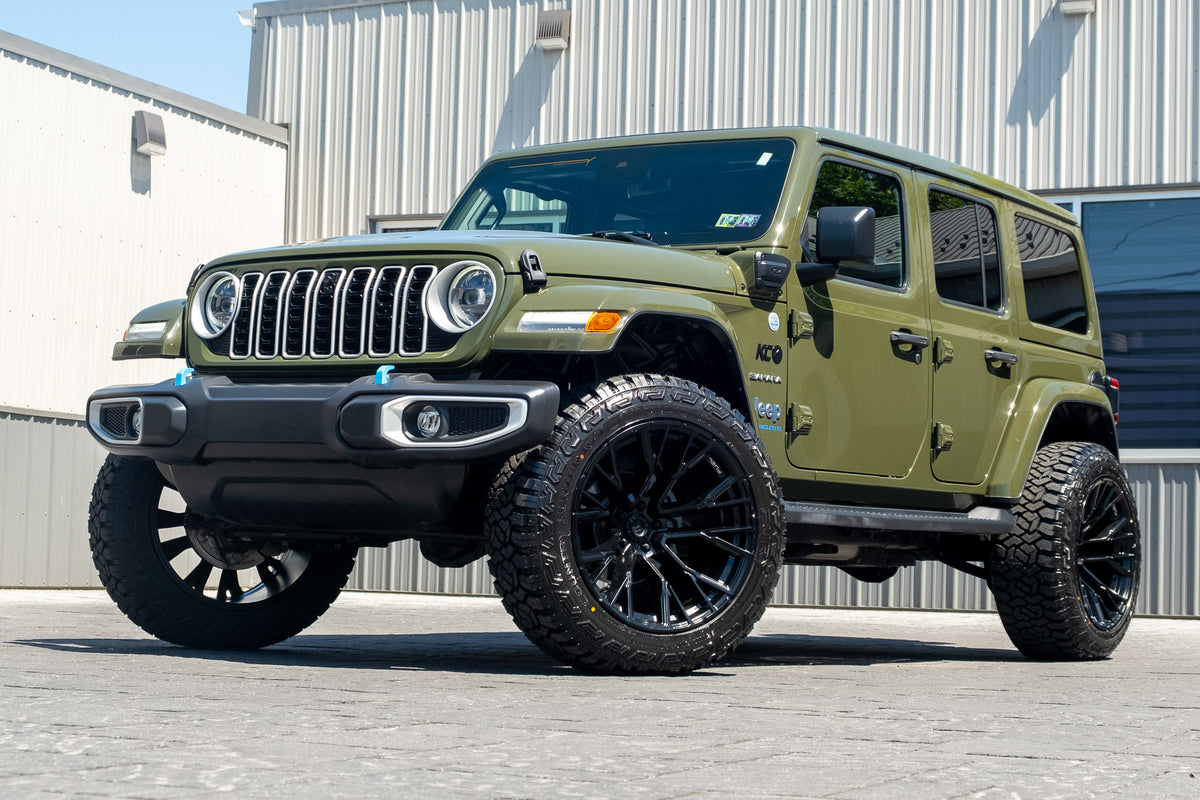 2024 Jeep Wrangler Sahara 4XE with a 2.5" Rough Country lift kit, 22x12 Fuel Rebar wheels, and 35" Fury Country Hunter R/T tires.