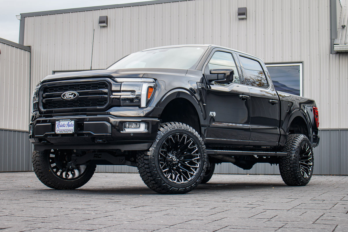 2024 Ford F-150 Lariat with a 6" Rough Country lift kit, 22x12 Fuel Strike wheels, and 35" Fury Country Hunter R/T tires.