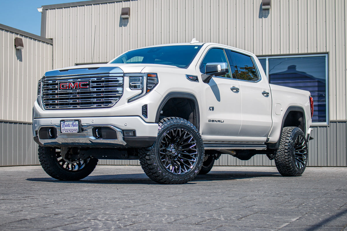 2024 GMC Sierra 1500 Denali with a 6" Rough Country suspension kit, 22x12 Fuel Strike wheels, and 35" Fury Country Hunter R/T tires.