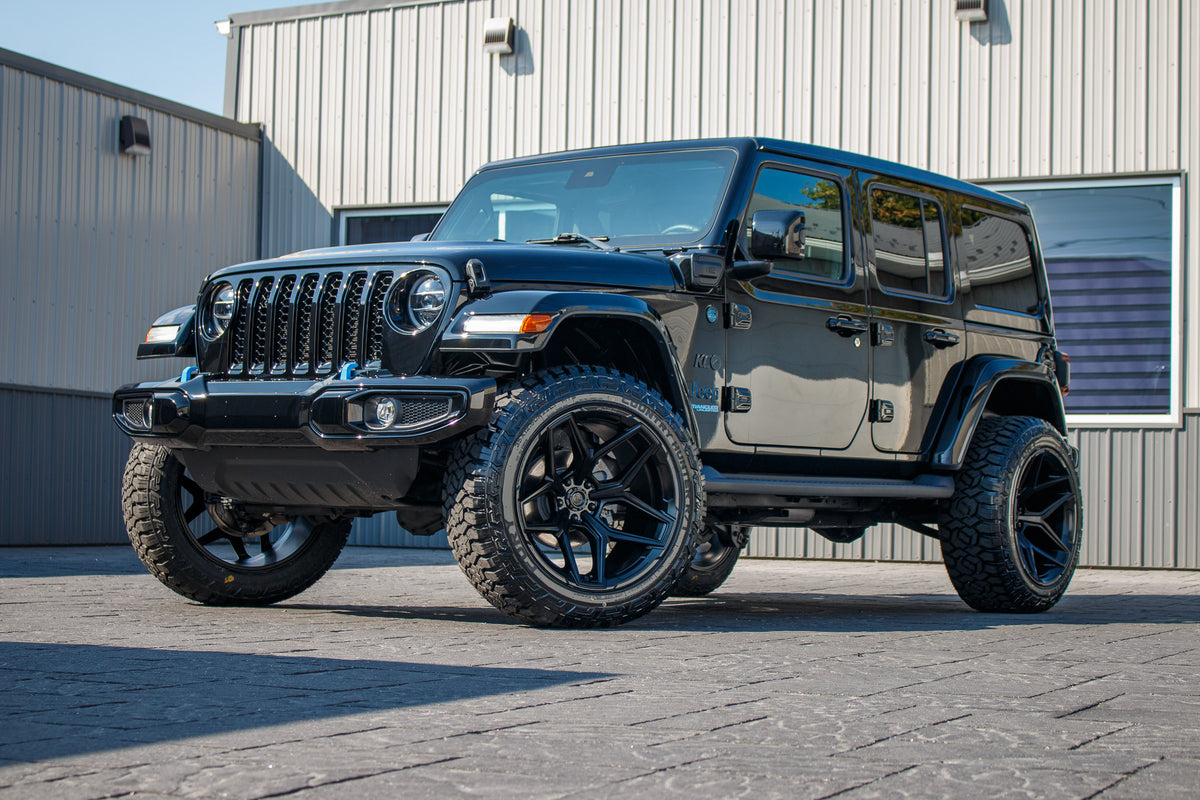 2021 Jeep Wrangler Unlimited Sahara 4XE with a 2.5" Rough Country lift kit, 22x12 Fuel Burn wheels, and 35" Fury Country Hunter R/T tires.