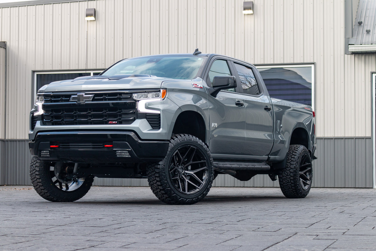 2024 Chevrolet Silverado 1500 LT Trail Boss with a 6" Rough Country lift kit, 22x12 Fuel Flux wheels, and 35" Fury Country Hunter R/T tires.