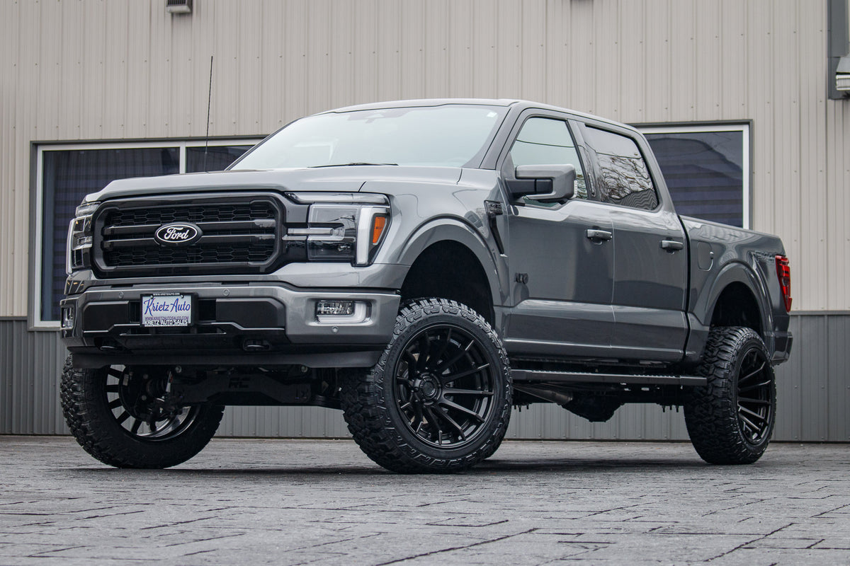 2024 Ford F-150 Lariat with a 6" Rough Country lift kit, 22x12 Fuel Burn wheels, and 35" Fury Country Hunter R/T tires.