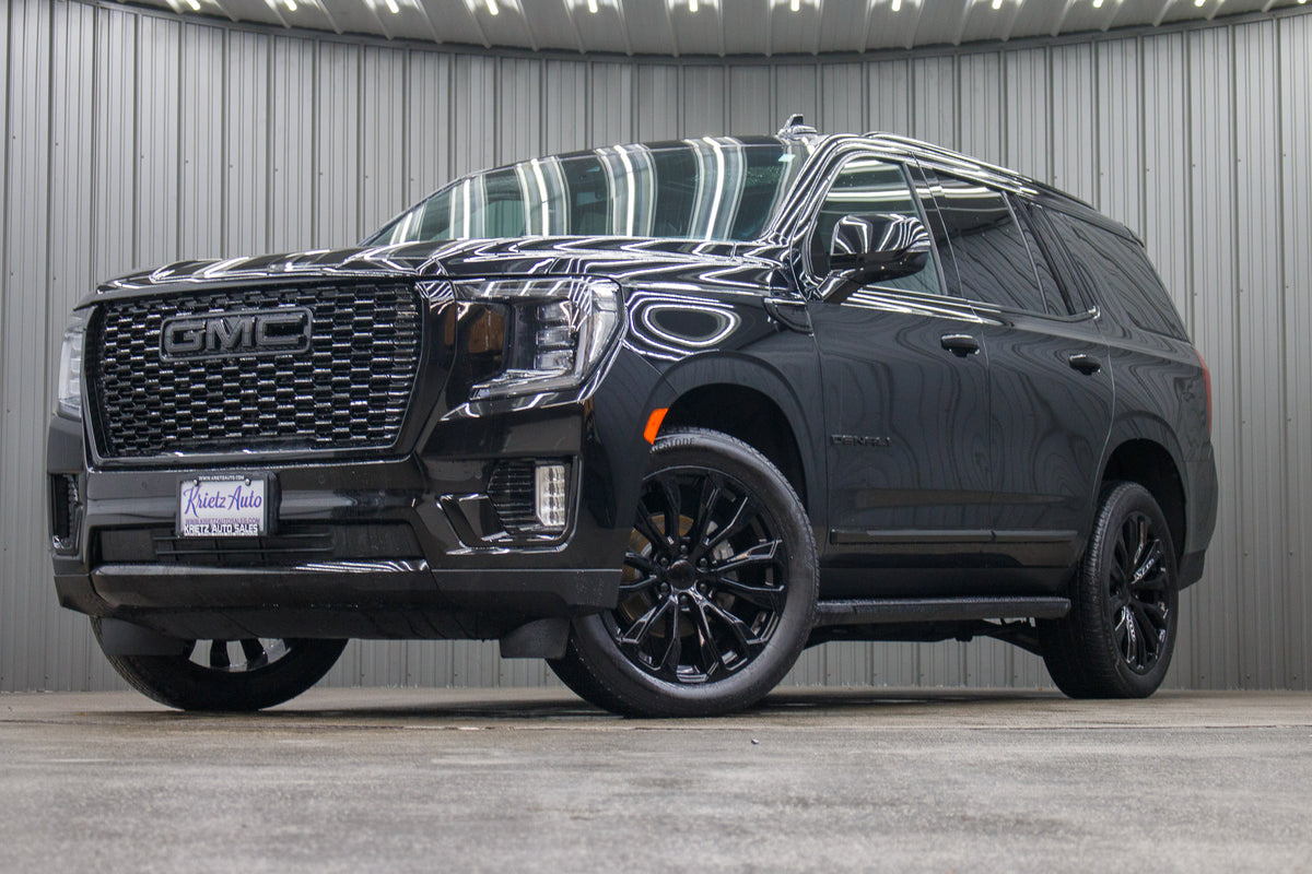 2023 GMC Yukon Denali with GMC Factory suspension, 22x9 GMC Stock wheels, and Bridgestone Alenza tires.