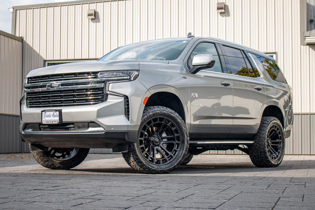 2023 Chevrolet Tahoe LT with a 3" ReadyLift lift kit, 22x10 Fuel Heater wheels, and 295/50 Toyo Open Country AT3 tires.