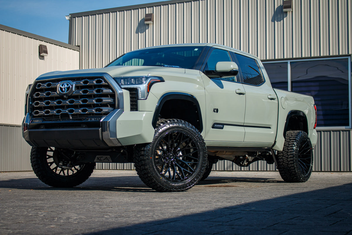 2024 Toyota Tundra Platinum with a 6" Rough Country lift kit, 22x12 TIS 566B wheels, and 35" Fury Country Hunter R/T tires.
