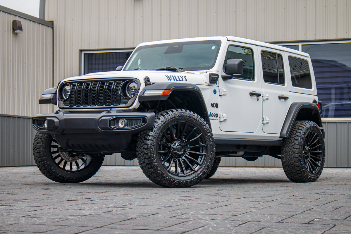 2025 Jeep Wrangler Willys 4XE with a 2.5" Rough Country lift kit, 22x10 Fuel Blade wheels, and 35" Fury Country Hunter R/T tires.