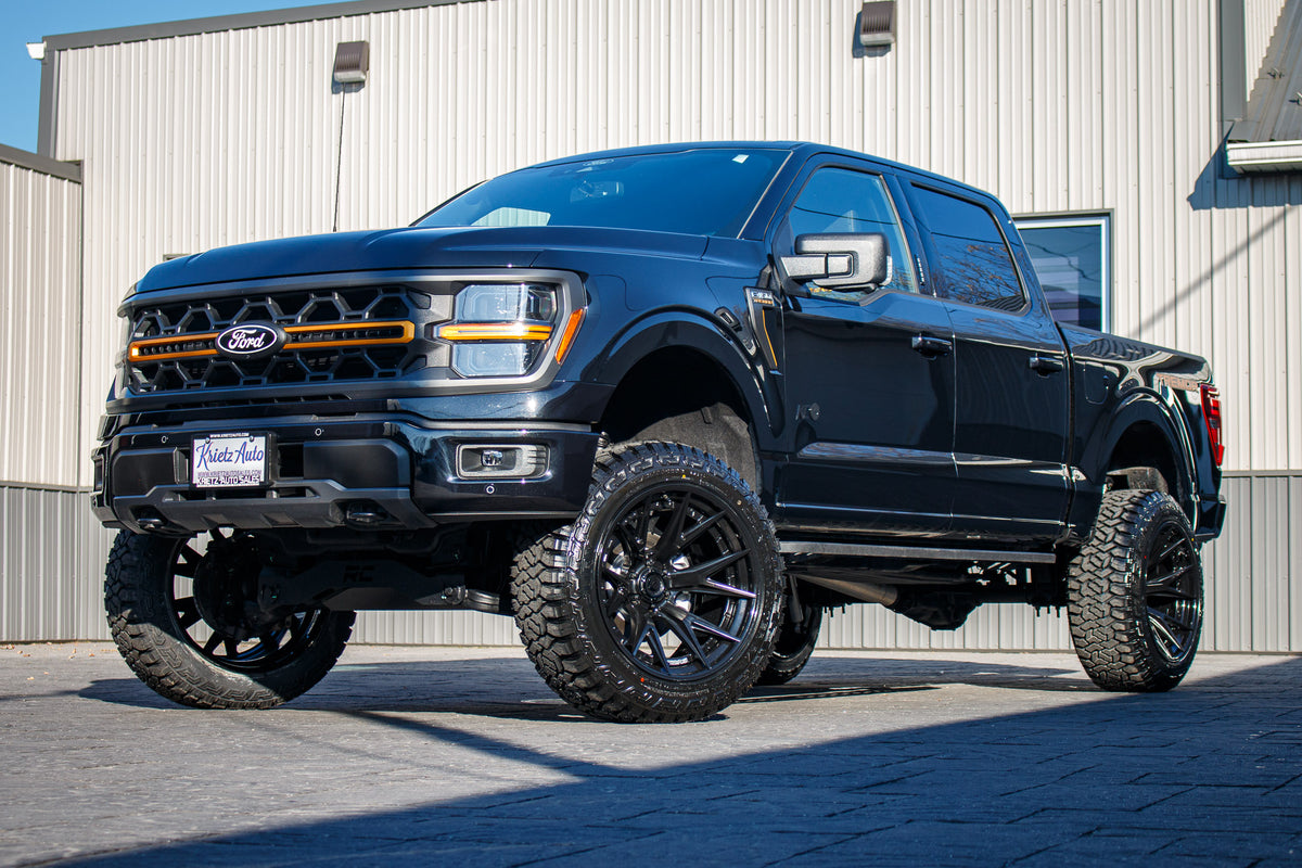 2024 Ford F-150 Tremor with a 6" Rough Country lift kit, 22x12 Fuel Catalyst wheels, and 35" Fury Country Hunter R/T tires.