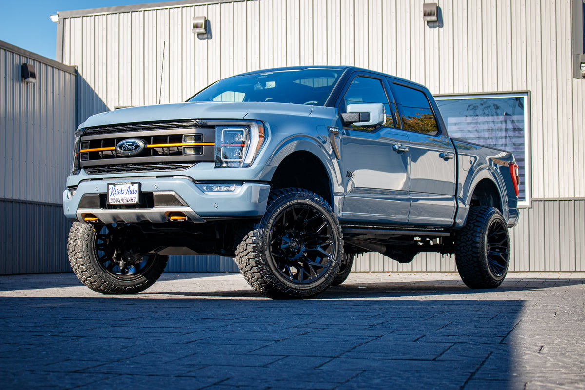 2023 Ford F-150 Tremor with a 6" Rough Country lift kit, 22x12 Fuel Twitch wheels, and 35" Fury Country Hunter R/T tires.
