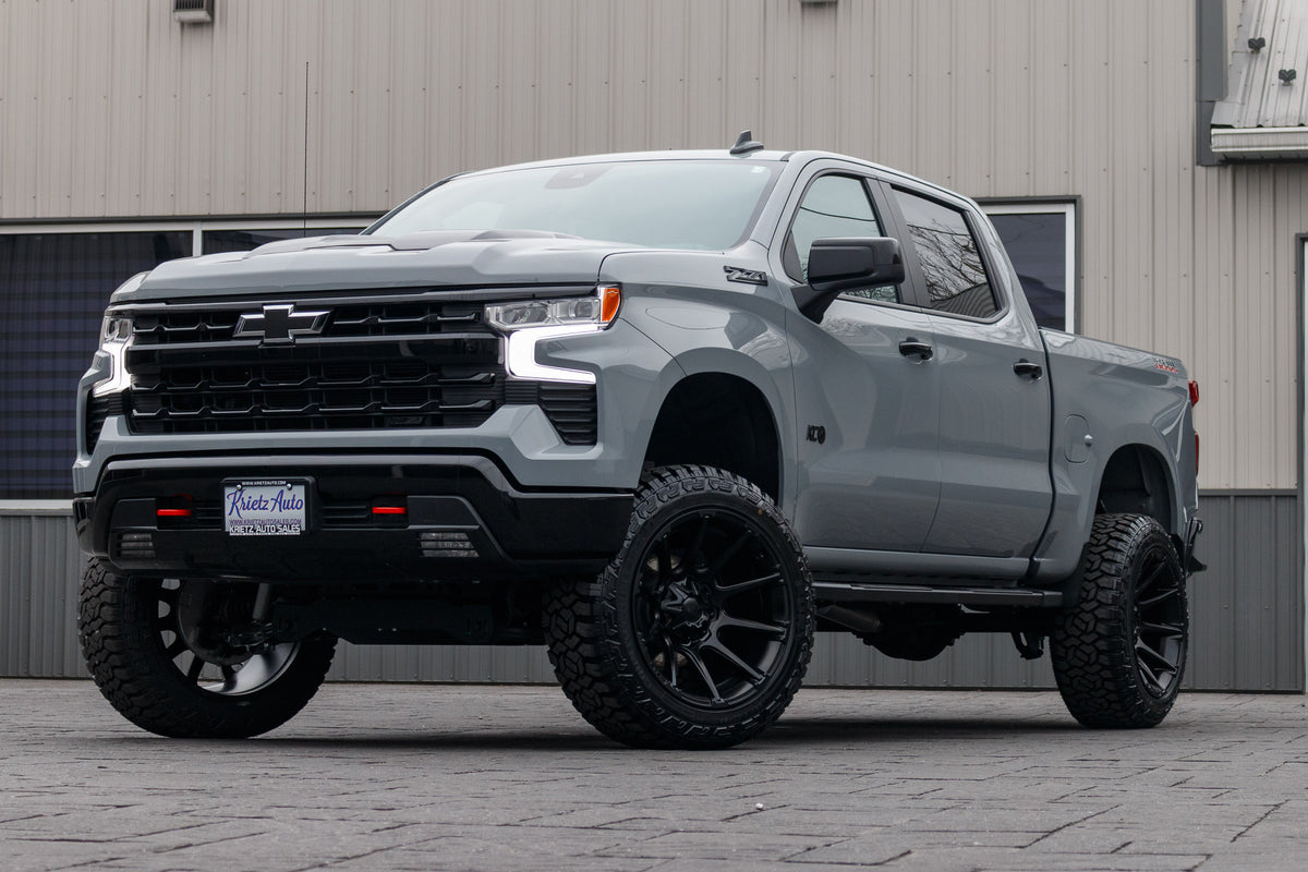 2024 Chevrolet Silverado 1500 LT Trail Boss with a 6" Rough Country lift kit, 22x12 Fuel Super C wheels, and 35" Fury Country Hunter R/T tires.