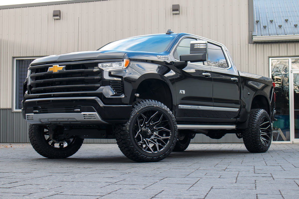 2024 Chevrolet Silverado 1500 High Country with a 6" Rough Country suspension kit, 22x12 Fuel Twitch wheels, and 35" Fury Country Hunter R/T tires.