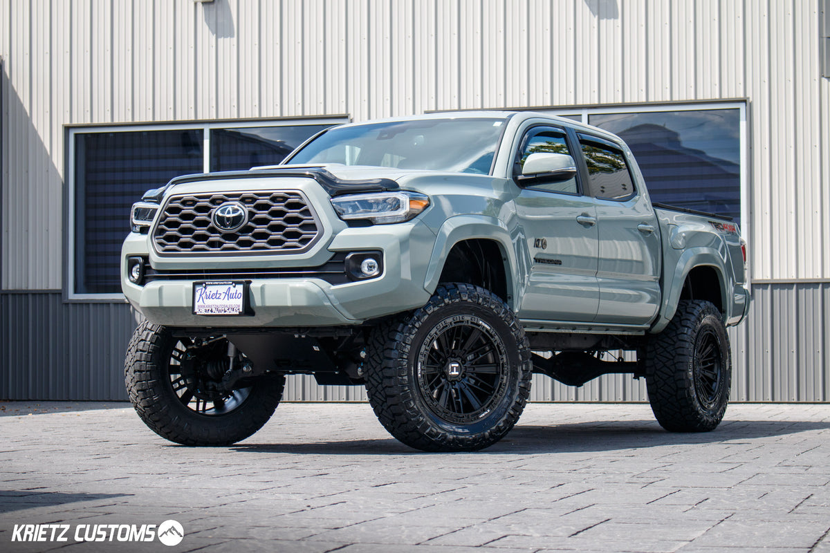 2022 Toyota Tundra TRD Off-Road with a 6" Rough Country lift kit, 20x9 Hostile Mojave wheels and 35" Nitto Ridge Grappler tires.