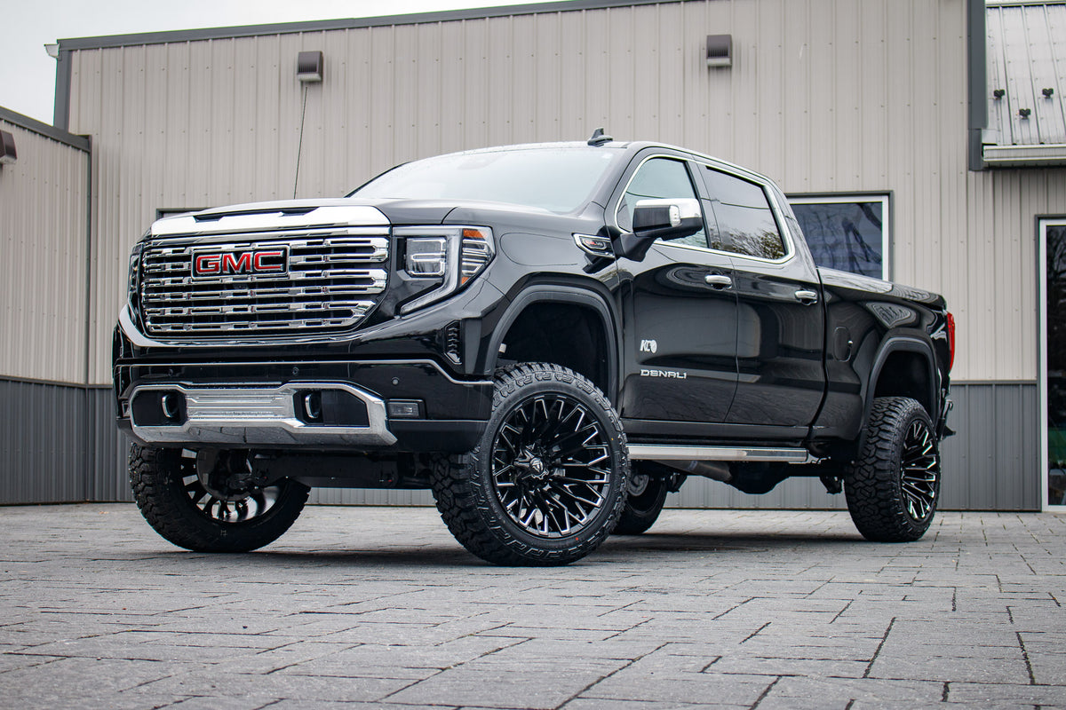 2024 GMC Sierra 1500 Denali with a 6" Rough Country lift kit, 22x12 Fuel Strike wheels, and 35" Fury Country Hunter R/T tires.