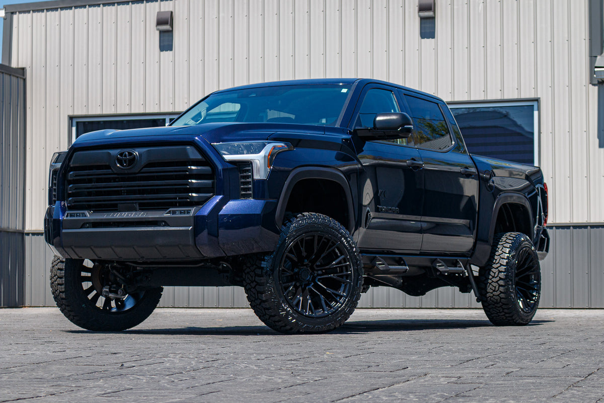 2024 Toyota Tundra SR with a 6" Rough Country lift kit, 22x12 Fuel Rebar wheels, and 35" Fury Country Hunter R/T tires.