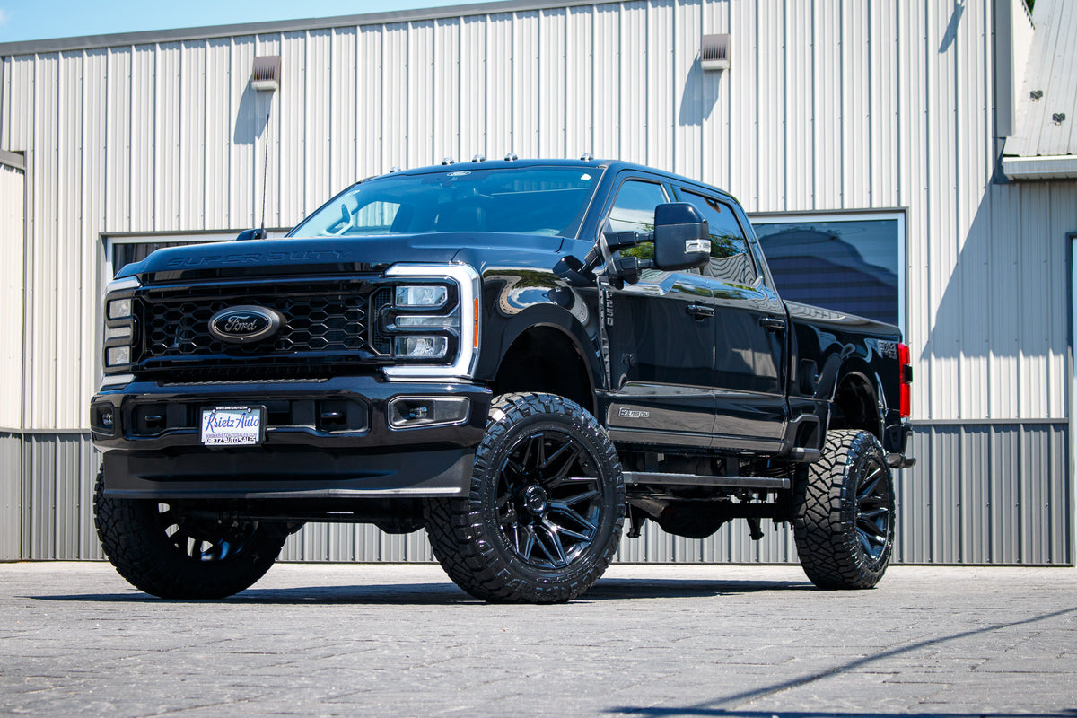 2025 Ford F-250 Super Duty Lariat with a 6" ReadyLift lift kit, 22x12 Fuel Flux wheels, and 37" Nitto Ridge Grappler tires.