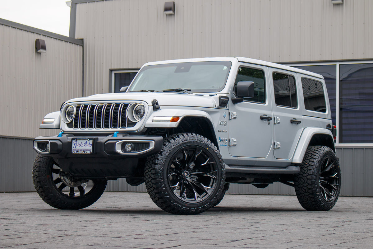 2024 Jeep Wrangler Unlimited Sahara 4XE with a 2.5" Rough Country lift kit, 22x12 Fuel Flame wheels, and 35" Fury Country Hunter R/T tires.