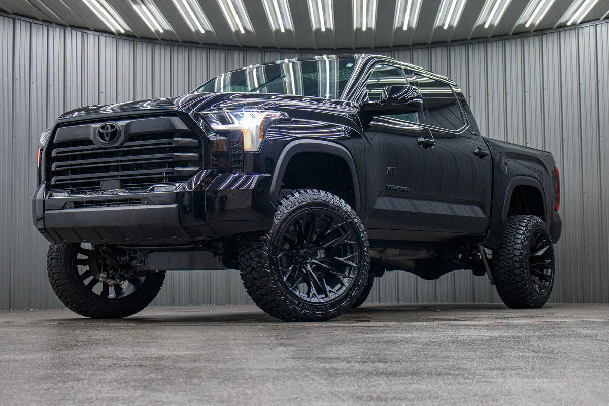 2025 Toyota Tundra Limited with a 6" Rough Country lift kit, 22x12 Fuel Flame wheels, and 35" Fury Country Hunter R/T tires.