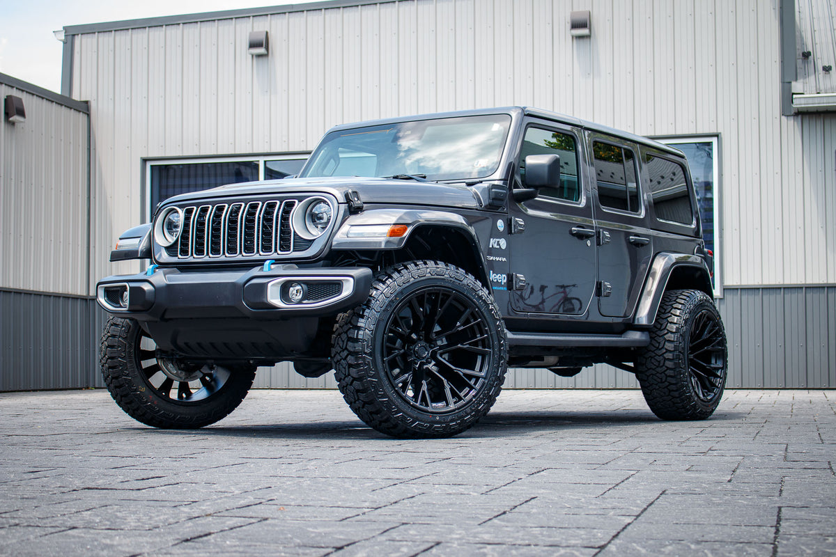2024 Jeep Wrangler Unlimited Sahara 4XE with a 2.5" Rough Country lift kit, 22x12 Fuel Rebar wheels, and 35" Fury Country Hunter R/T tires.