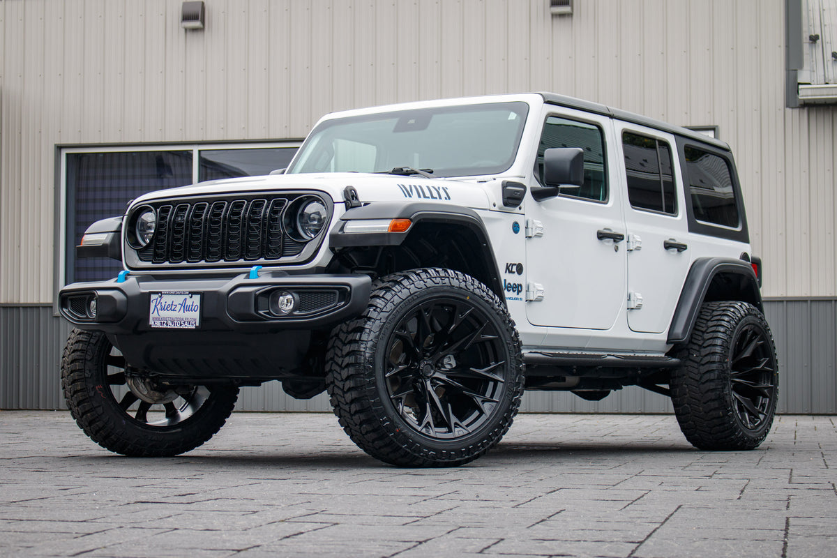 2024 Jeep Wrangler Unlimited Sahara 4XE with a 2.5" Rough Country lift kit, 22x12 Fuel Flame wheels, and 35" Avix Trailtek R/T tires.