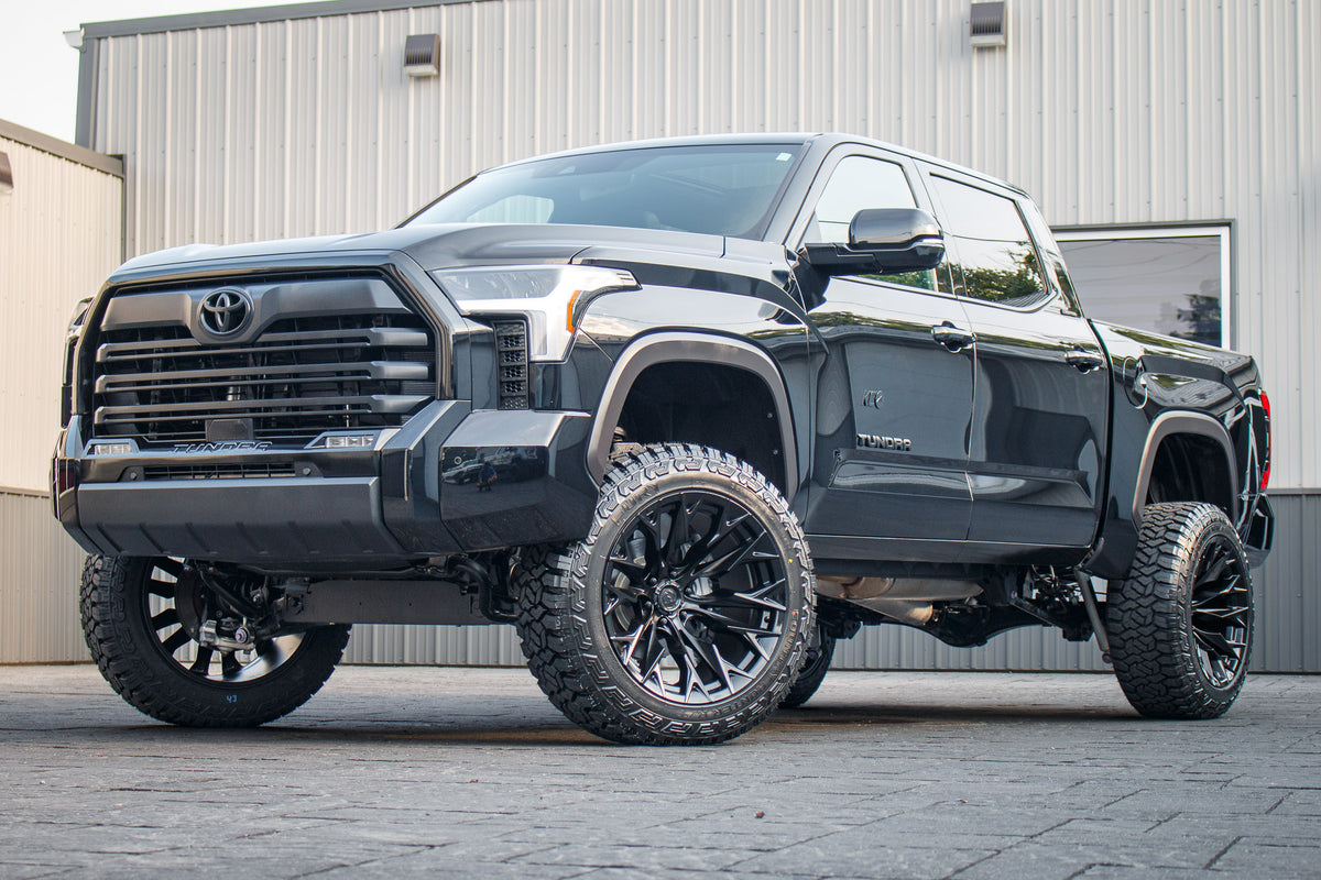 2025 Toyota Tundra Limited with a 6" Rough Country lift kit, 22x12 Fuel Flame wheels, and 35" Fury Country Hunter R/T tires.