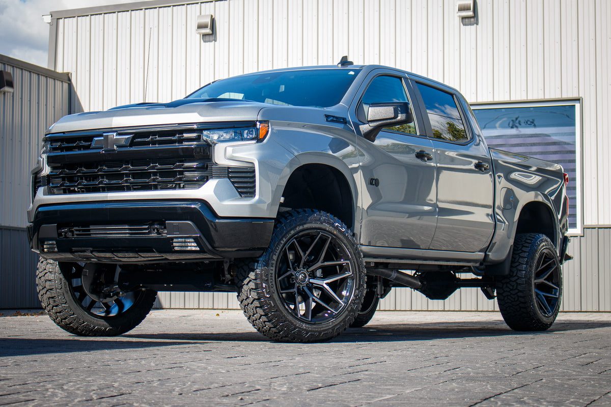 2025 Chevrolet Silverado 1500 with a 6" Rough Country lift kit, 22x12 Fuel Flux wheels, and 35" Fury Country Hunter R/T tires.