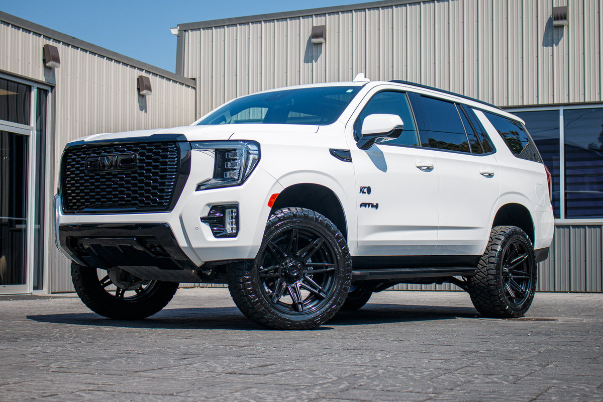 2024 GMC Yukon AT4 with a 3" ReadyLift lift kit, 22x10 Fuel Brawl wheels, and 295/50 Nitto Ridge Grappler tires.