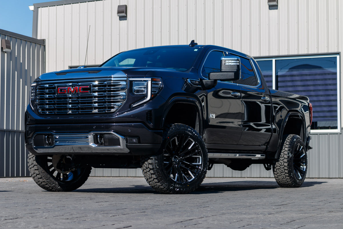 2024 GMC Sierra 1500 Denali with a 6" Rough Country lift kit, 22x12 Fuel Rebar wheels, and 35" Fury Country Hunter R/T tires.