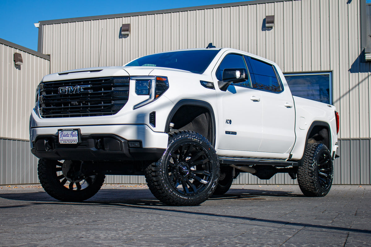 2023 GMC Sierra 1500 Elevation with a 6" Rough Country lift kit, 22x12 Fuel Blitz wheels, and 35" Fury Country Hunter R/T tires.