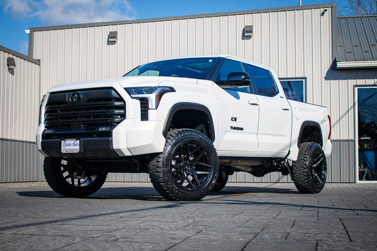 2024 Toyota Tundra Limited with a 6" Rough Country lift kit, 22x12 Fuel Flux wheels, and 35" Fury Country Hunter R/T tires.