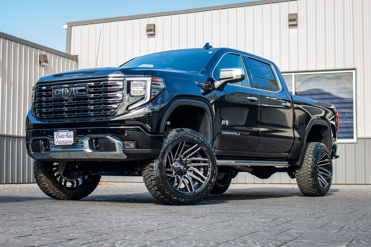 2024 GMC Sierra 1500 Denali Ultimate with a 6" Rough Country suspension kit, 22x12 Fuel Typhoon wheels, and 35" Fury Country Hunter R/T tires.