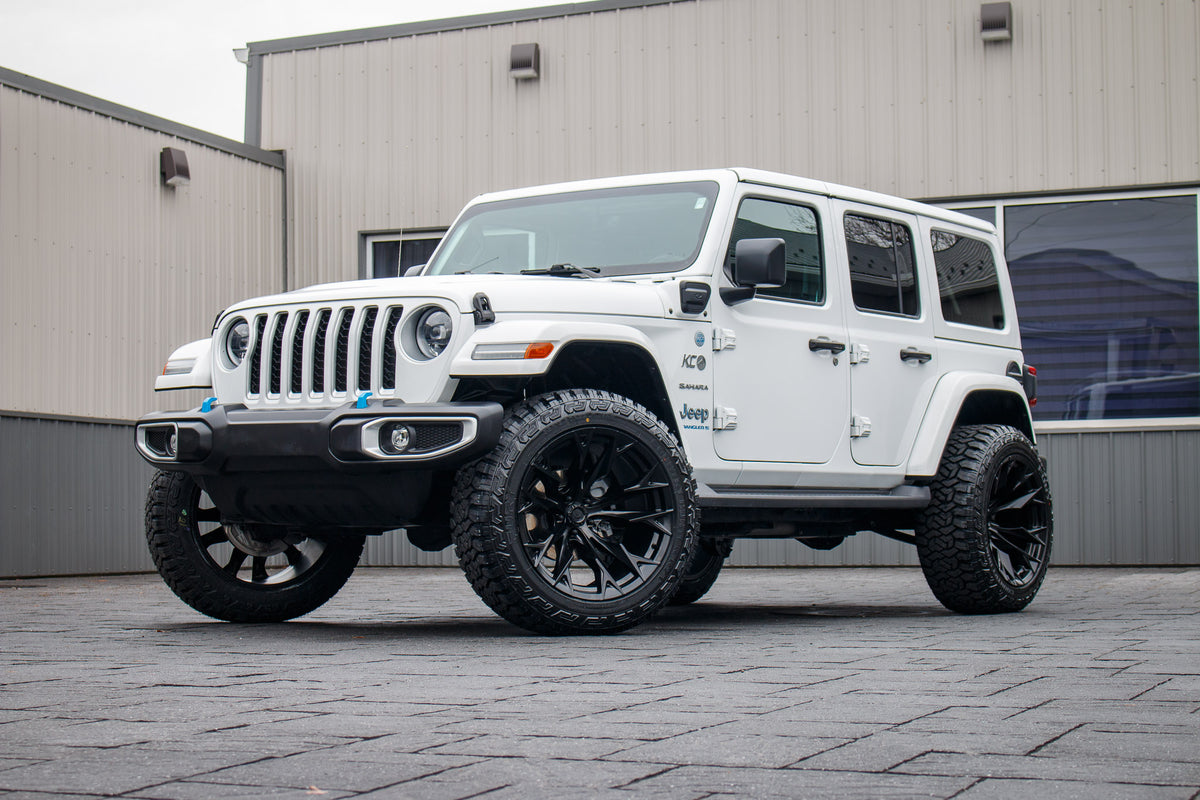 2023 Jeep Wrangler Sahara 4XE with a 2.5" Rough Country lift kit, 22x12 Fuel Flame wheels, and 35" Fury Country Hunter R/T tires.