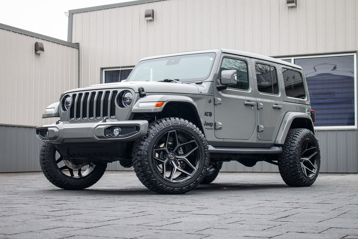 2022 Jeep Wrangler Unlimited Sahara Altitude with a 2.5" Rough Country lift kit, 22x12 Fuel Flux wheels, and 35" Fury Country Hunter R/T tires.