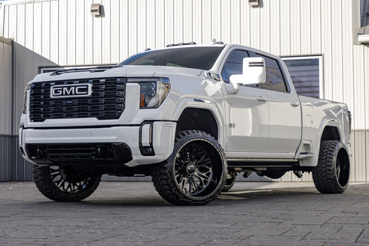 2024 GMC Sierra 2500 Denali Ultimate with a 3" Cognito Leveling kit, 24x14 American Force Intrepid wheels, and 33" Fury Country Hunter M/T tires.