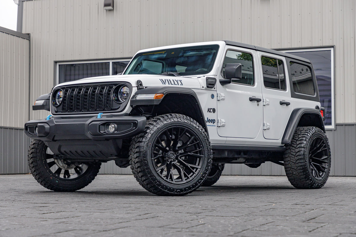 2024 Jeep Wrangler Unlimited Willys 4XE with a 2.5" Rough Country lift kit, 22x12 Fuel Rebar wheels, and 35" Avix Trailtek R/T tires.