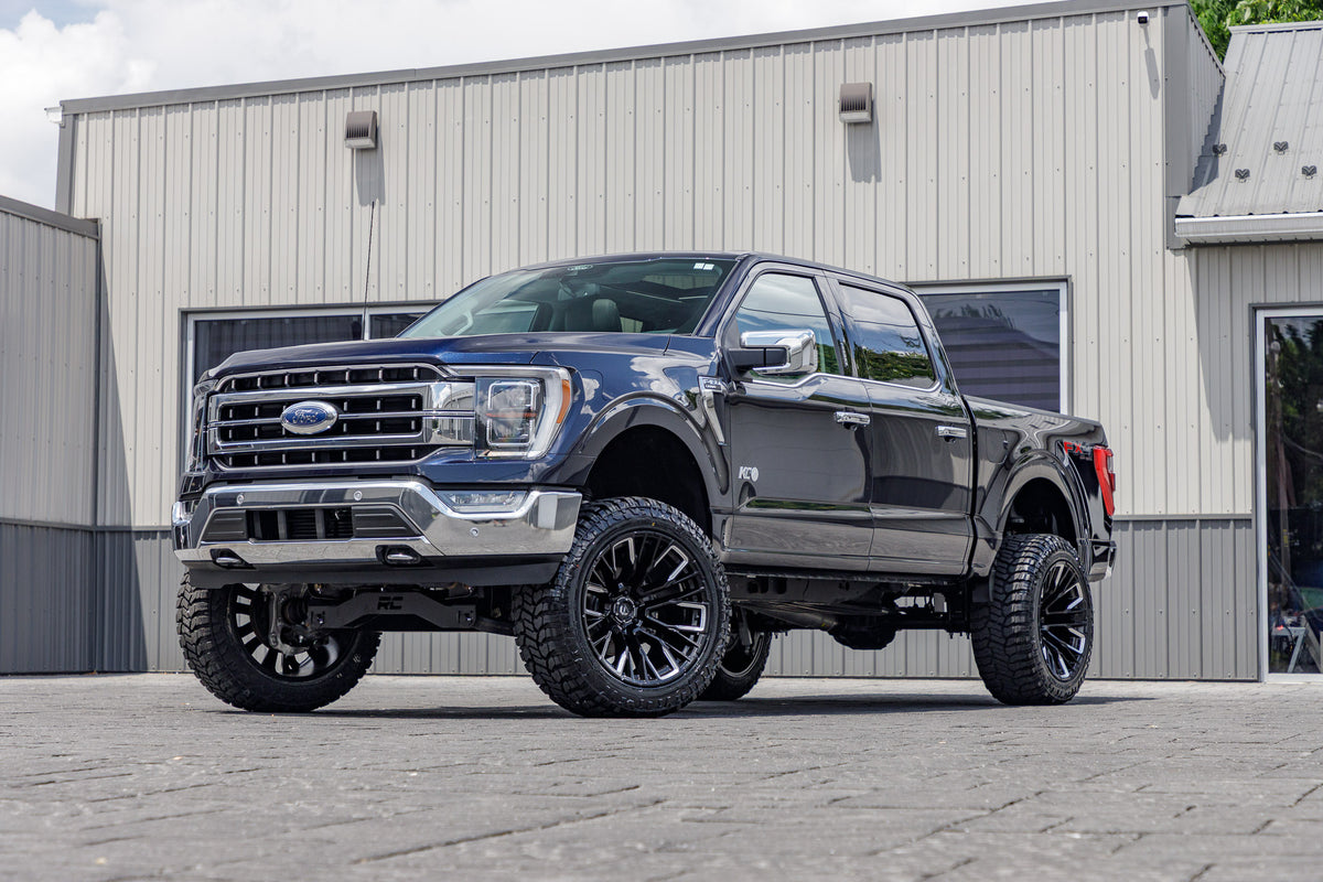 2022 Ford F-150 Lariat with a 6" Rough Country lift kit, 22x12 Fuel Rebar wheels, and 35" Avix Trailtek R/T tires.