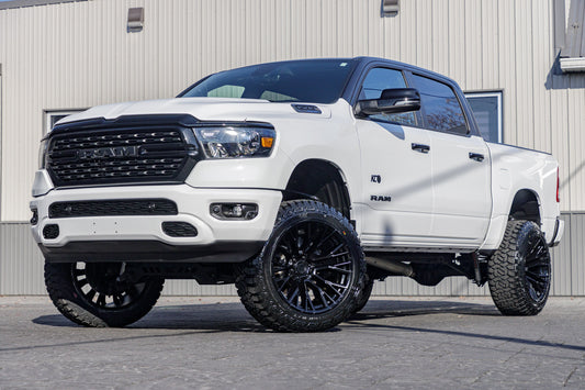 2024 Ram 1500 Lone Star with a 6" Rough Country lift kit, 22x12 Fuel Rebar wheels, and 35" Fury Country Hunter R/T tires.