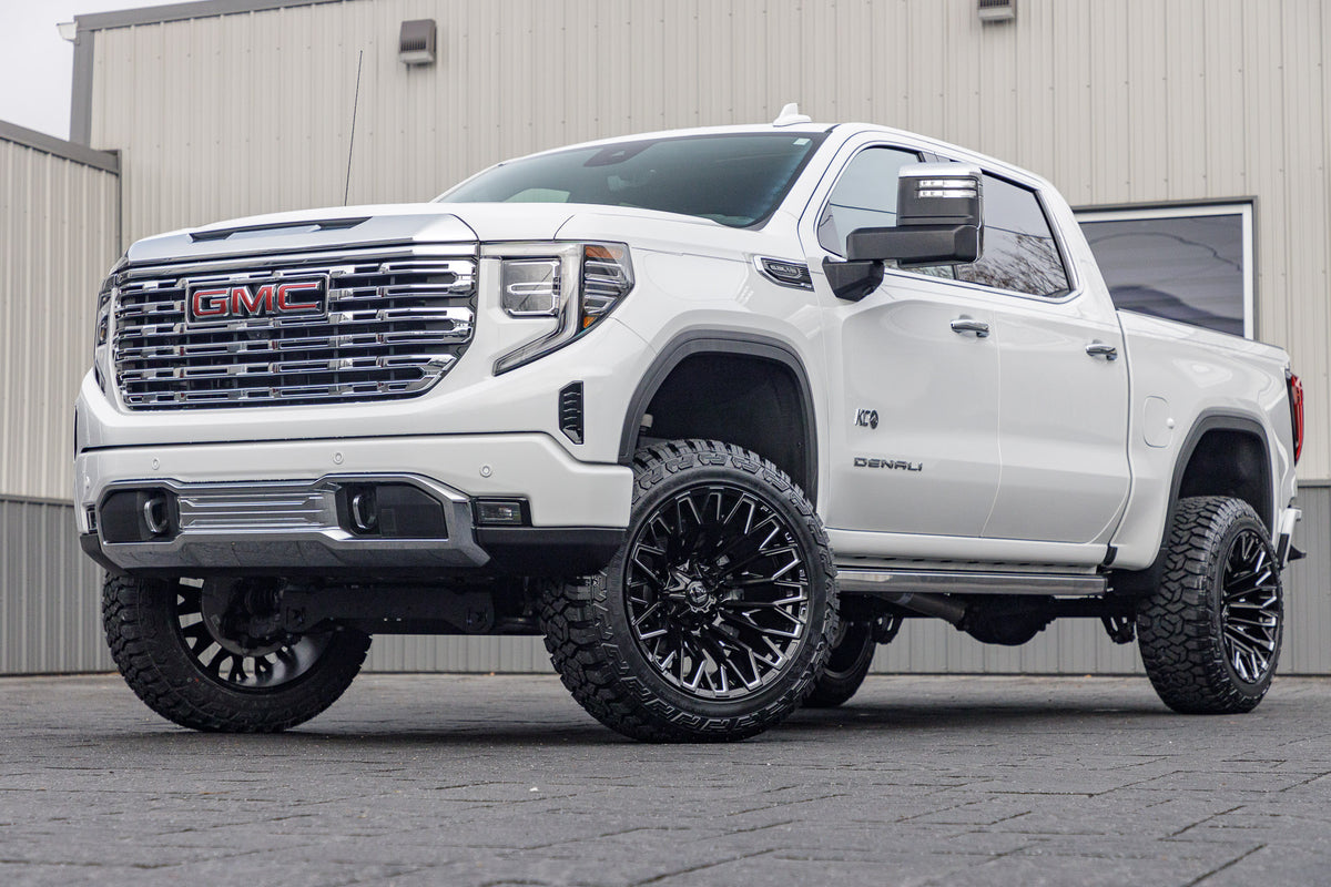 2024 GMC Sierra 1500 Denali with a 6" Rough Country lift kit, 22x12 Fuel Strike wheels, and 35" Fury Country Hunter R/T tires.