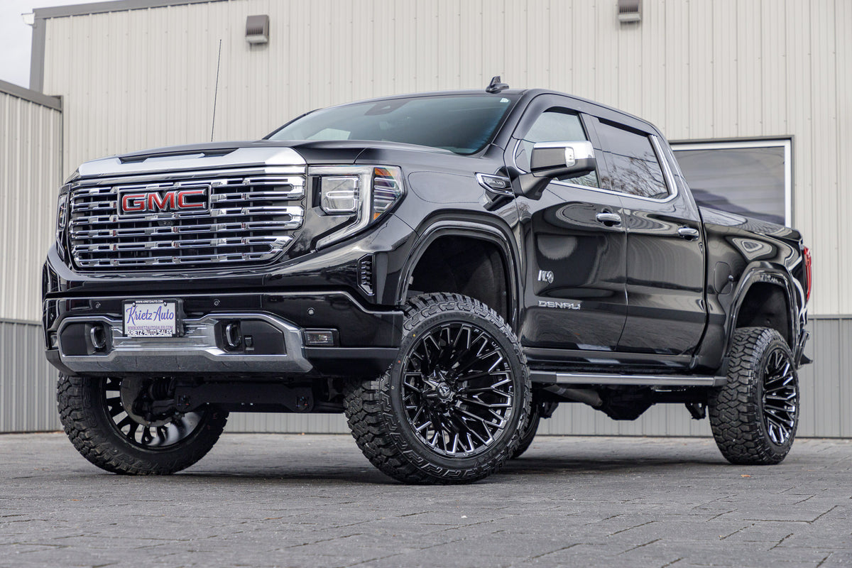 2024 GMC Sierra 1500 Denali with a 6" Rough Country lift kit, 22x12 Fuel Strike wheels, and 35" Fury Country Hunter R/T tires.