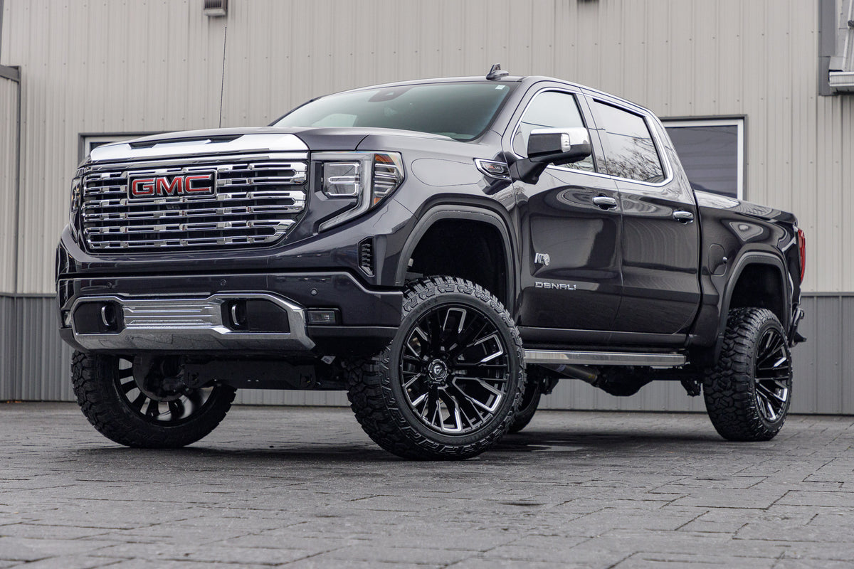 2024 GMC Sierra 1500 Denali with a 6" Rough Country lift kit, 22x12 Fuel Rebar wheels, and 35" Fury Country Hunter R/T tires.