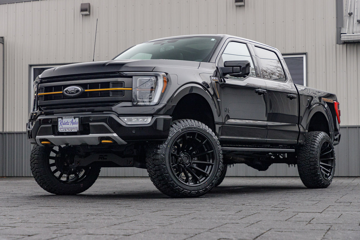 2023 Ford F-150 Tremor with a 6" Rough Country lift kit, 22x12 Fuel Burn wheels, and 35" Fury Country Hunter R/T tires.