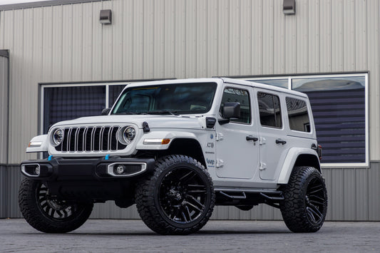 2024 Jeep Wrangler with a 2.5" Rough Country lift kit, 22x12 Fuel Typhoon wheels, and 35" Fury Country Hunter R/T tires.