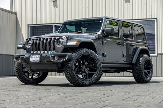 2022 Jeep Wrangler Unlimited Rubicon 4XE with Jeep Stock suspension, 22x12 Fuel Flux wheels, and 35" Fury Country Hunter R/T tires.
