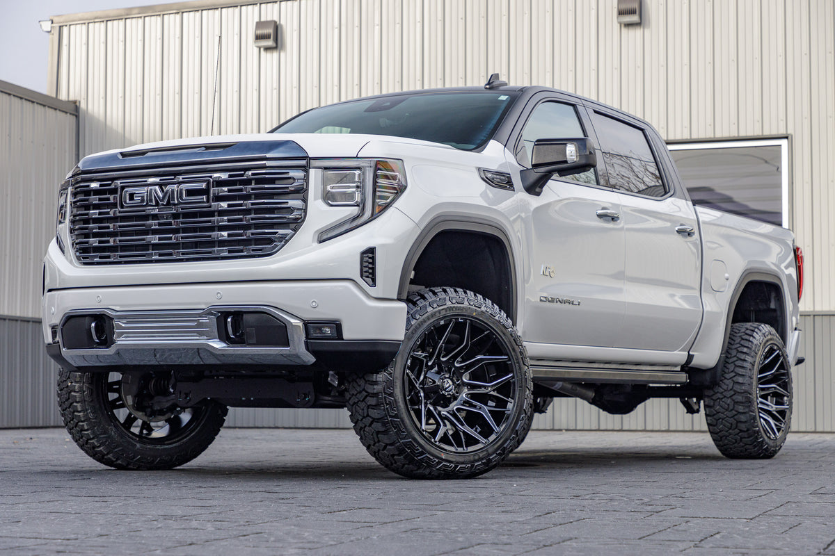 2024 GMC Sierra 1500 Denali Ultimate with a 6" Rough Country suspension kit, 22x12 Fuel Twitch wheels, and 35" Fury Country Hunter R/T tires.