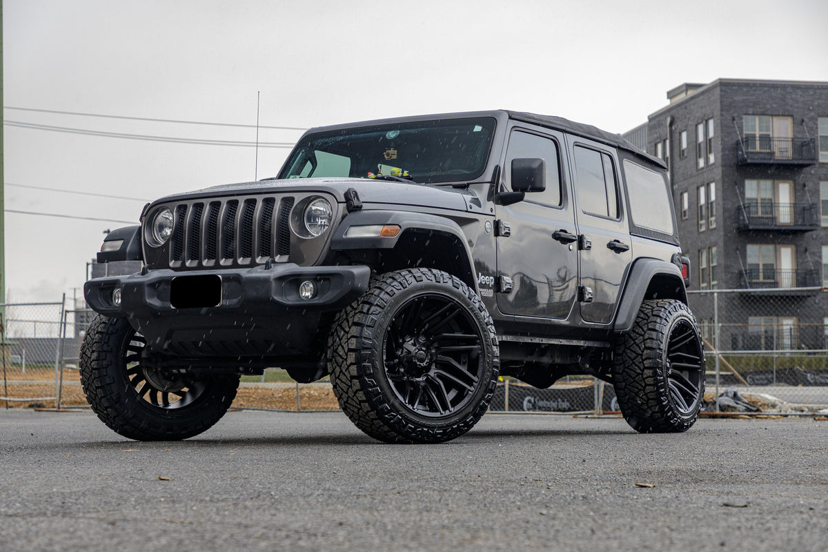 2018 Jeep Wrangler Unlimited Sport S with a 3" ReadyLift lift kit, 22x12 Fuel Typhoon wheels, and 35" Nitto Ridge Grappler tires.