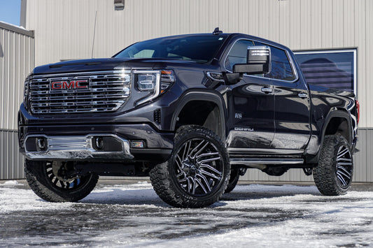 2024 GMC Sierra 1500 Denali with a 6" Rough Country lift kit, 22x12 Fuel Typhoon wheels, and 35" Fury Country Hunter R/T tires.