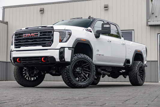 2025 GMC Sierra 2500 AT4 with a 5" BDS lift kit, 22x12 Fuel Typhoon wheels, and 37" Nitto Ridge Grappler tires.