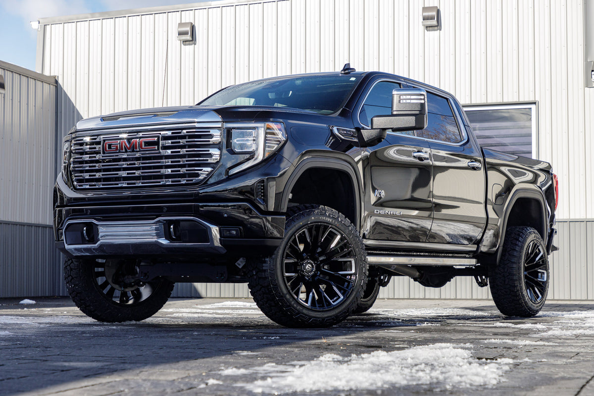 2024 GMC Sierra 1500 Denali with a 6" Rough Country suspension kit, 22x12 Fuel Rebar wheels, and 35" Fury Country Hunter R/T tires.