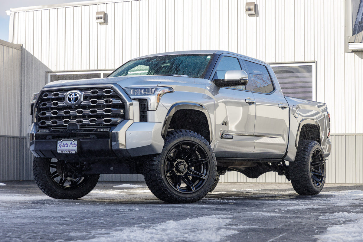 2024 Toyota Tundra Platinum with a 6" Rough Country lift kit, 22x12 Fuel Brawl wheels, and 35" Fury Country Hunter R/T tires.
