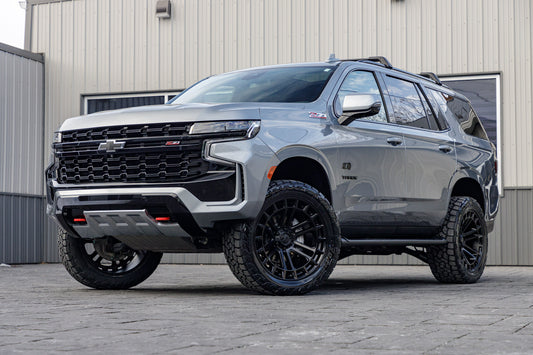 2023 Chevrolet Tahoe Z71 with a 3" ReadyLift lift kit, 22x10 Fuel Heater wheels, and 295/50 Toyo Open Country A/T III tires.