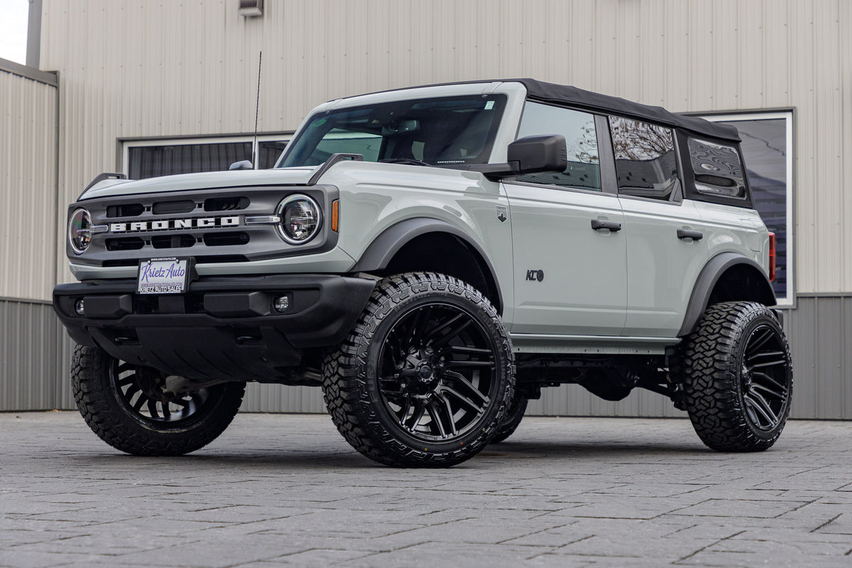2023 Ford Bronco Big Bend with a 3.5" Rough Country lift kit, 22x12 Fuel Typhoon wheels, and 35" Fury Country Hunter R/T tires.